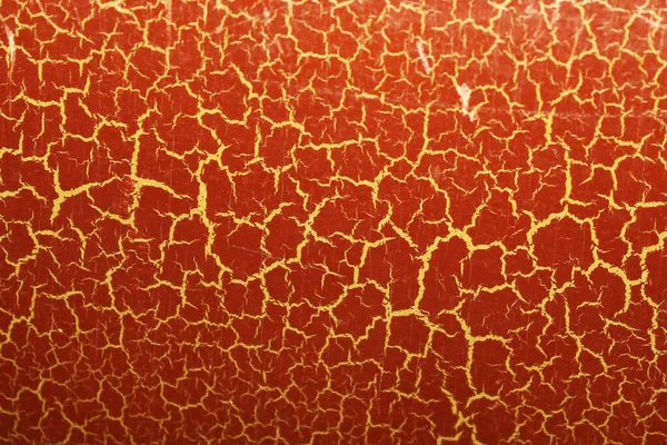 Soyut doku kırmızı ve altın çatlakları çözülmüş.