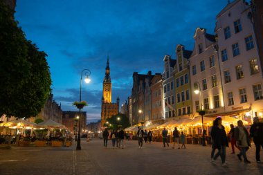 Scenic summer evening panorama of the architectural evening street of the Old Town GDANSK, POLAND - July 6, 2022