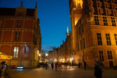 Scenic summer evening panorama of the architectural evening street of the Old Town GDANSK, POLAND - July 6, 2022
