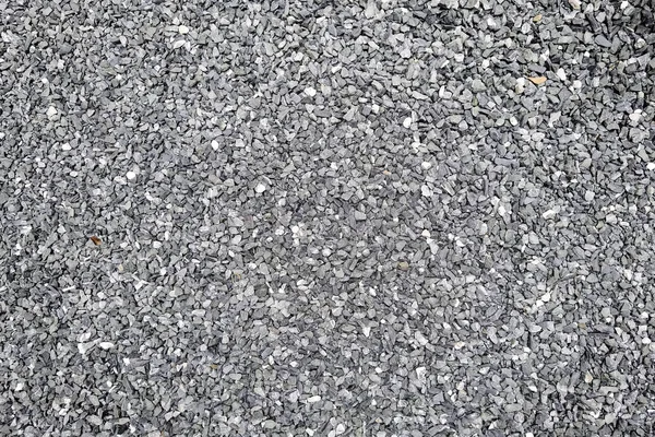 Gray small rocks ground texture for background