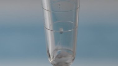 Hand of boy making covid 19 homemade swab test