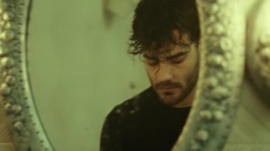 Mad boy in the bathroom making beard foam