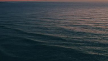 Aerial view of waves ocean in the morning time