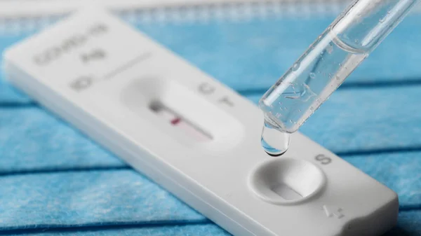 Making the covid swab test in the house