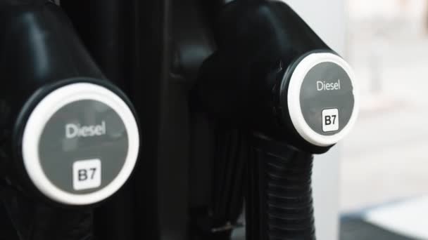 Diesel and petrol pumps at the gas station — Stock Video
