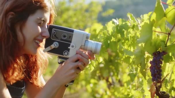 Young Photographer Girl Shoots Video Vintage Film Camera — Wideo stockowe