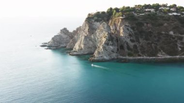 Cliff of Calabria land near the mediterranean sea in summer season. Aerial drone shoot.