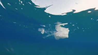 Plastic in the calm Mediterranean sea.