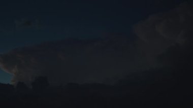 Lightning storm in the clouds in the night sky. Static shoot