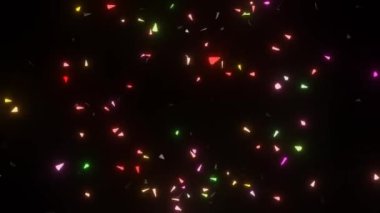 Renkli parlak parçalar siyah bir arka planda patlar, uzayda bir süre süzülür ve yavaşça dışarı çıkar. Renkli parçacıklarla havai fişek benzeri efekt