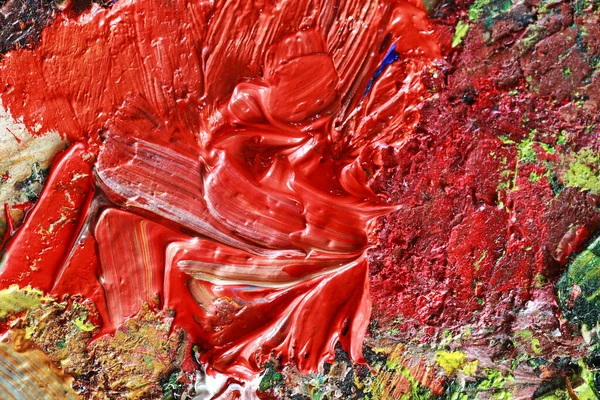 Tuval üzerine yağlı boya boya. Sanat eserinin bir parçası yakından çekildi. Çağdaş sanat. Renkli bir arka plan. Kaotik çok renkli felçler. Gerçek fırça darbeleri.