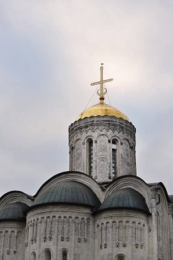 VLADIMIR, RUSSIA - November 4, 2021: golden cross on the dome of the Assumption Cathedral in Vladimir