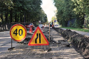 road signs and paving stones along Izmailovsky Boulevard in Moscow, Russia