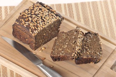bread with sunflower seeds on a wooden board