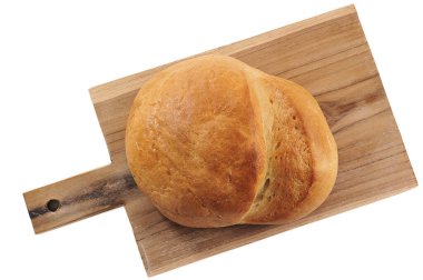 loaf of bread - round bread isolated on wooden background - top view flat lay