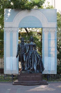 MOSCOW, RUSSIA - July 17, 2021: monument to Pushkin and Natalia Goncharova in the Old Arbat in Moscow