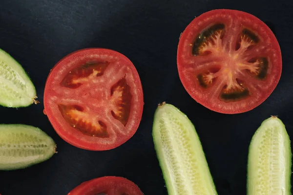 Red Tomatoes Cucumbers Cut Halves Top View Flat Lay — стоковое фото