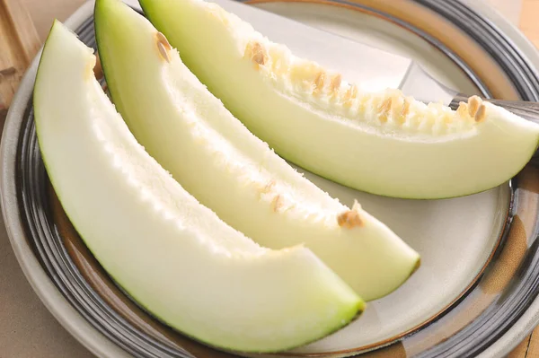 Melon Slices Plate Knife — Stockfoto