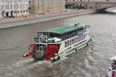 MOSCOW, RUSSIA - June 6, 2021: pleasure boat sailing on the Moscow river with tourists