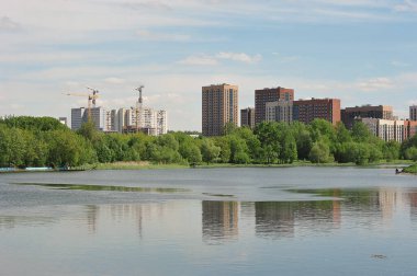 view from the silver-grape pond on the new houses in Izmailov in Moscow