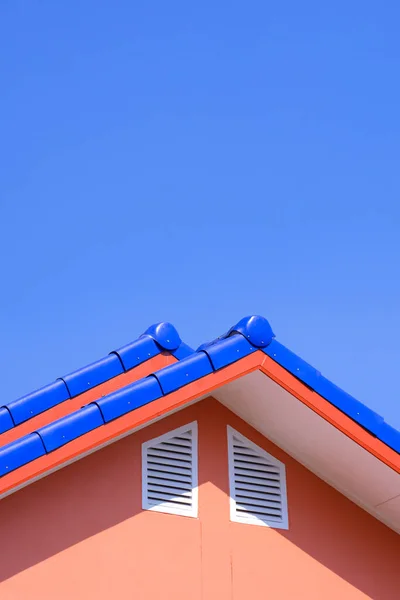 Blue Different Level Ridge Capping Tiled Roofs White Attic Windows — Stockfoto