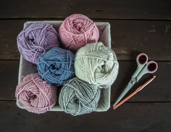 Pastel Colored Woolen Balls Basket Scissors Crochet Hook Dark Brown — Stock Photo, Image