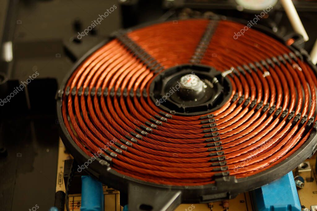 spiral of an induction cooker. Parts for induction