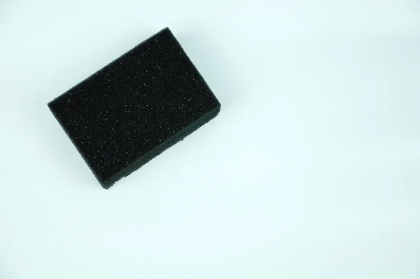 Esponja Negra Utilizada Para Lavar Platos Tiene Dos Superficies Rugosas —  Fotos de Stock