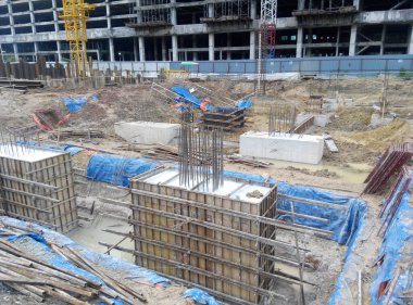 SELANGOR, MALAYSIA -May 25, 2015: The concrete pile cap concreted at the construction site in Selangor Malaysia. The pile cap is the part of the building foundation.  clipart