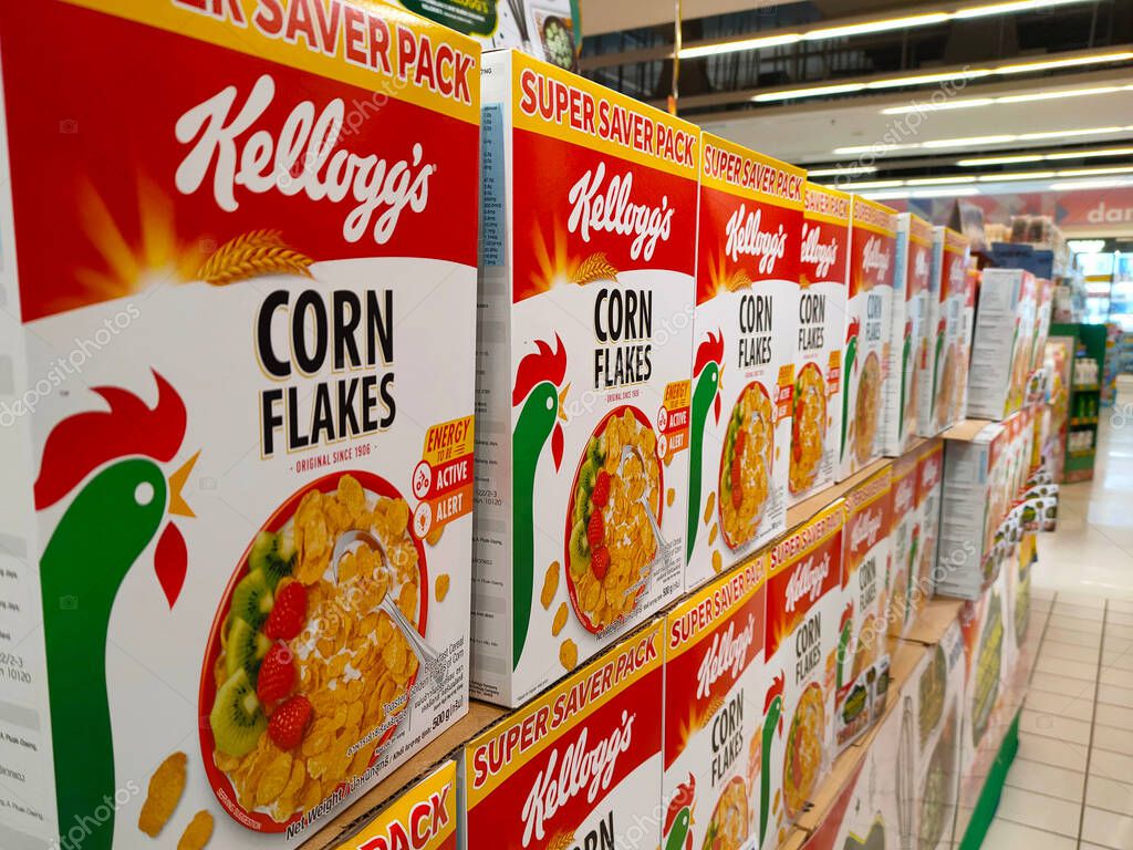 SELANGOR, MALAYSIA - MARCH 5, 2022: SELANGOR, MALAYSIA - MARCH 5, 2022: Kellogg's corn flakes in commercial packaging are made from paper boxes. On display for sale in-store.