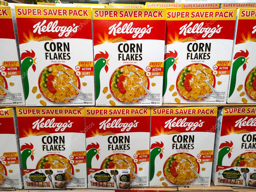 SELANGOR, MALAYSIA - MARCH 5, 2022: SELANGOR, MALAYSIA - MARCH 5, 2022: Kellogg's corn flakes in commercial packaging are made from paper boxes. On display for sale in-store.