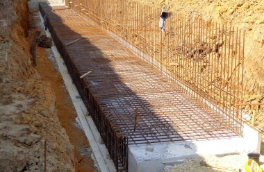 SELANGOR, MALAYSIA - JULY 22, 2021: Retaining wall is under construction. The retaining wall was built according to the engineer's design. The site is excavated to build the foundation structure