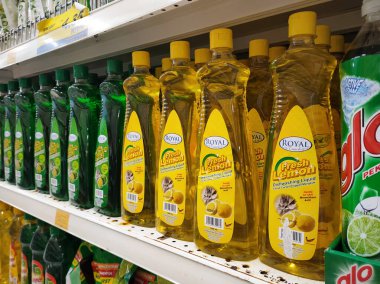 SELANGOR, MALAYSIA -APRIL 7, 2022: A variety of dishwashing liquids are displayed on a sales shelf. Have a price tag to make it easier for customers to choose. Separated by brand.