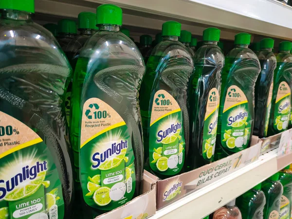 SELANGOR, MALAYSIA -APRIL 7, 2022: A variety of dishwashing liquids are displayed on a sales shelf. Have a price tag to make it easier for customers to choose. Separated by brand.