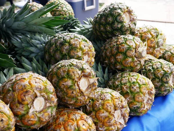 Pineapples that have been picked are displayed for sale. Pineapples are tropical fruits. Pineapple is suitable to be eaten as it is or used as a cooking ingredient.