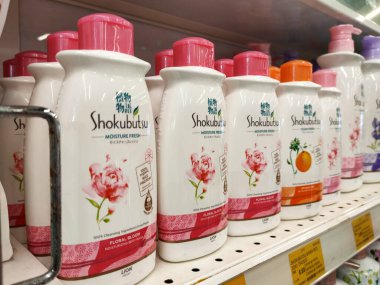 MELAKA, MALAYSIA -JUNE 6, 2022: Liquid bath soap in plastic bottles and commercial soft packets. Sorted by type and brand. Price tags are placed to make it easier for buyers.