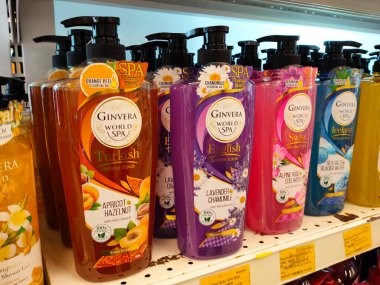 MELAKA, MALAYSIA -JUNE 6, 2022: Liquid bath soap in plastic bottles and commercial soft packets. Sorted by type and brand. Price tags are placed to make it easier for buyers.