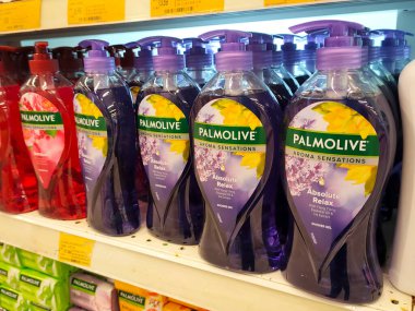 MELAKA, MALAYSIA -JUNE 6, 2022: Liquid bath soap in plastic bottles and commercial soft packets. Sorted by type and brand. Price tags are placed to make it easier for buyers.