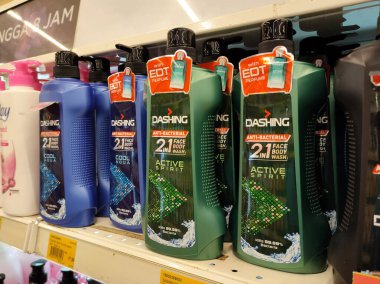 MELAKA, MALAYSIA -JUNE 6, 2022: Liquid bath soap in plastic bottles and commercial soft packets. Sorted by type and brand. Price tags are placed to make it easier for buyers.