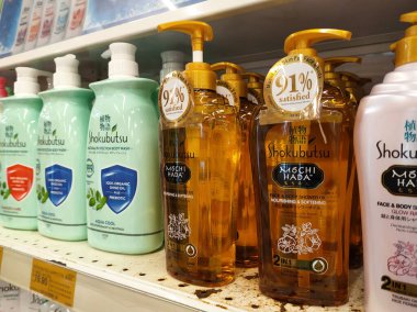 MELAKA, MALAYSIA -JUNE 6, 2022: Liquid bath soap in plastic bottles and commercial soft packets. Sorted by type and brand. Price tags are placed to make it easier for buyers.
