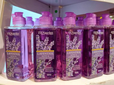 MELAKA, MALAYSIA -JUNE 6, 2022: Liquid bath soap in plastic bottles and commercial soft packets. Sorted by type and brand. Price tags are placed to make it easier for buyers.