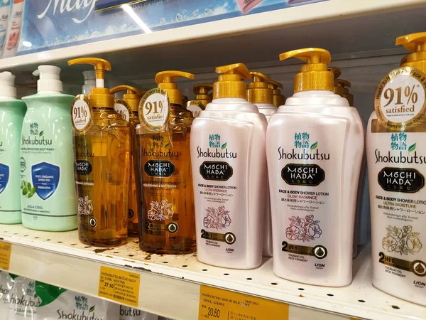 MELAKA, MALAYSIA -JUNE 6, 2022: Liquid bath soap in plastic bottles and commercial soft packets. Sorted by type and brand. Price tags are placed to make it easier for buyers.
