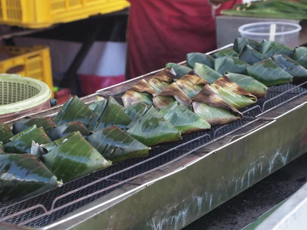 Satar is an exotic food very popular in peninsular Malaysia. It is made of raw fish and coconut, wrapped in fresh banana leaf. It has to be roasted before served.