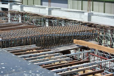 MALACCA, MALAYSIA -JULY 16, 2016: Hot rolled deformed steel bars or steel reinforcement bar at construction site. It is use to strengthen concrete known as reinforcement concrete. 