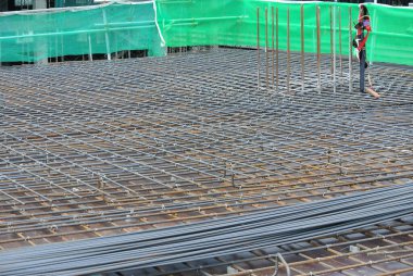 MALACCA, MALAYSIA -JULY 16, 2016: Hot rolled deformed steel bars or steel reinforcement bar at construction site. It is use to strengthen concrete known as reinforcement concrete. 