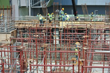 JOHOR, MALAYSIA -JULY 29, 2016: Scaffolding used as the temporary structure to support platform, form work and structure at the construction site. Also used it as a walking platform for workers. 