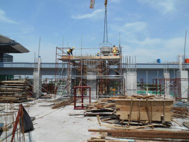 MALACCA, MALAYSIA -JUNE 13, 2016: Construction site in progress at Kuala Lumpur, Malaysia during daytime. Daily activity is ongoing. 