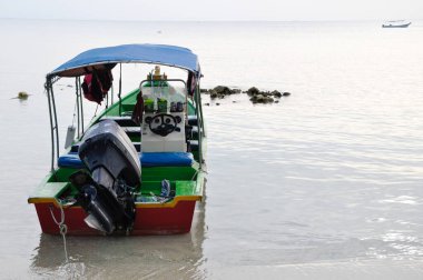 PERHENTIAN ISLAND, MALAYSIA -JUNE 30, 2012: Passenger boat  at the Perhentian Island in Malaysia. Used as personal or public transport. 