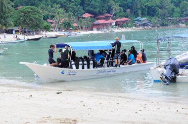 PERHENTIAN ISLAND, MALAYSIA -JUNE 30, 2012: Boats used by group of scuba divers. 