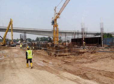 Malacca, Malaysia-13 Haziran 2016: şantiye gündüz sırasında Malacca, Malaysia, sürüyor. Günlük aktivite devam ediyor. 